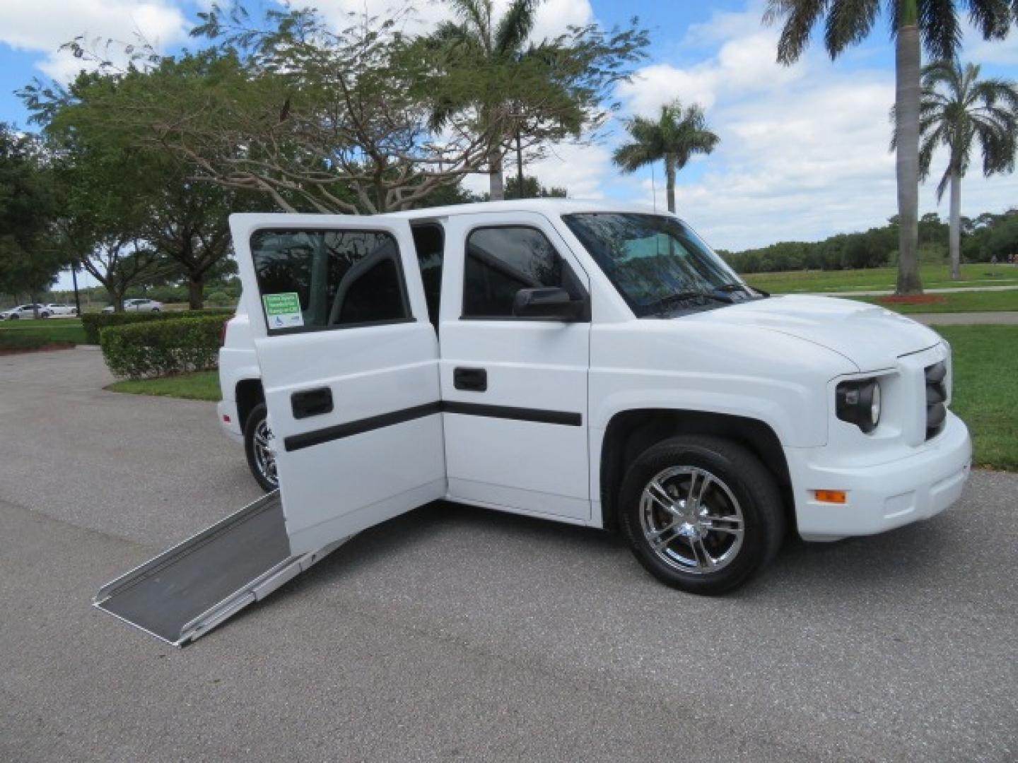 2012 White /Black with an 4.6L V8 engine, Automatic transmission, located at 4301 Oak Circle #19, Boca Raton, FL, 33431, (954) 561-2499, 26.388861, -80.084038 - You are looking at a Gorgeous 2012 Mobility Ventures MV1 Handicap Wheelchair Conversion Van with 64K Original Miles, 4.6L Ford V8, Bleack Leather Type Interior, Alloy Wheels, Power Side Entry Wheelchair Lift with Long Ramp and Short Ramp Function, Q Lock 150 EZ Lock, L-Track Tie Down System, Back Up - Photo#31